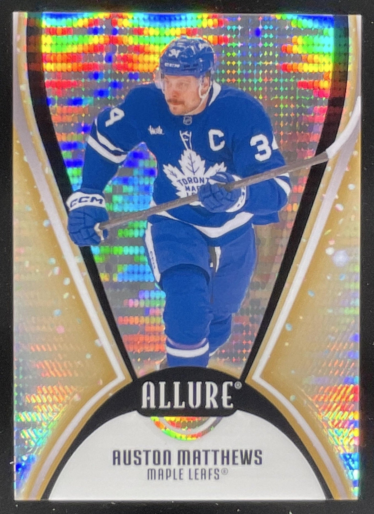 2025-26 Upper Deck Allure Gold Glitter Bomb #12 Auston Matthews /199 product image 1, provided for visual reference and