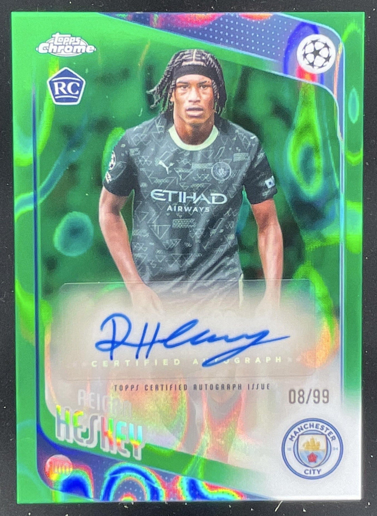 2025-26 Topps Chrome Chrome Green Lava #CA-RHE Reigan Heskey RC Auto /99 product image 1, provided for visual reference and