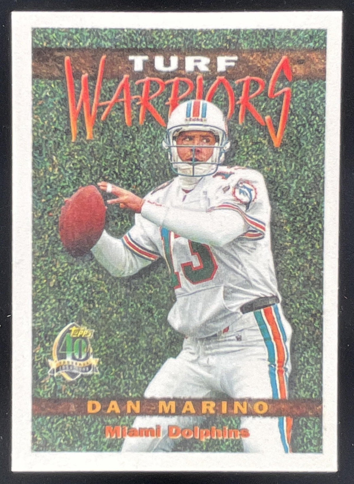 1996 Topps Turf Warriors #TW18 Dan Marino product image 1, provided for visual reference and product detail review
